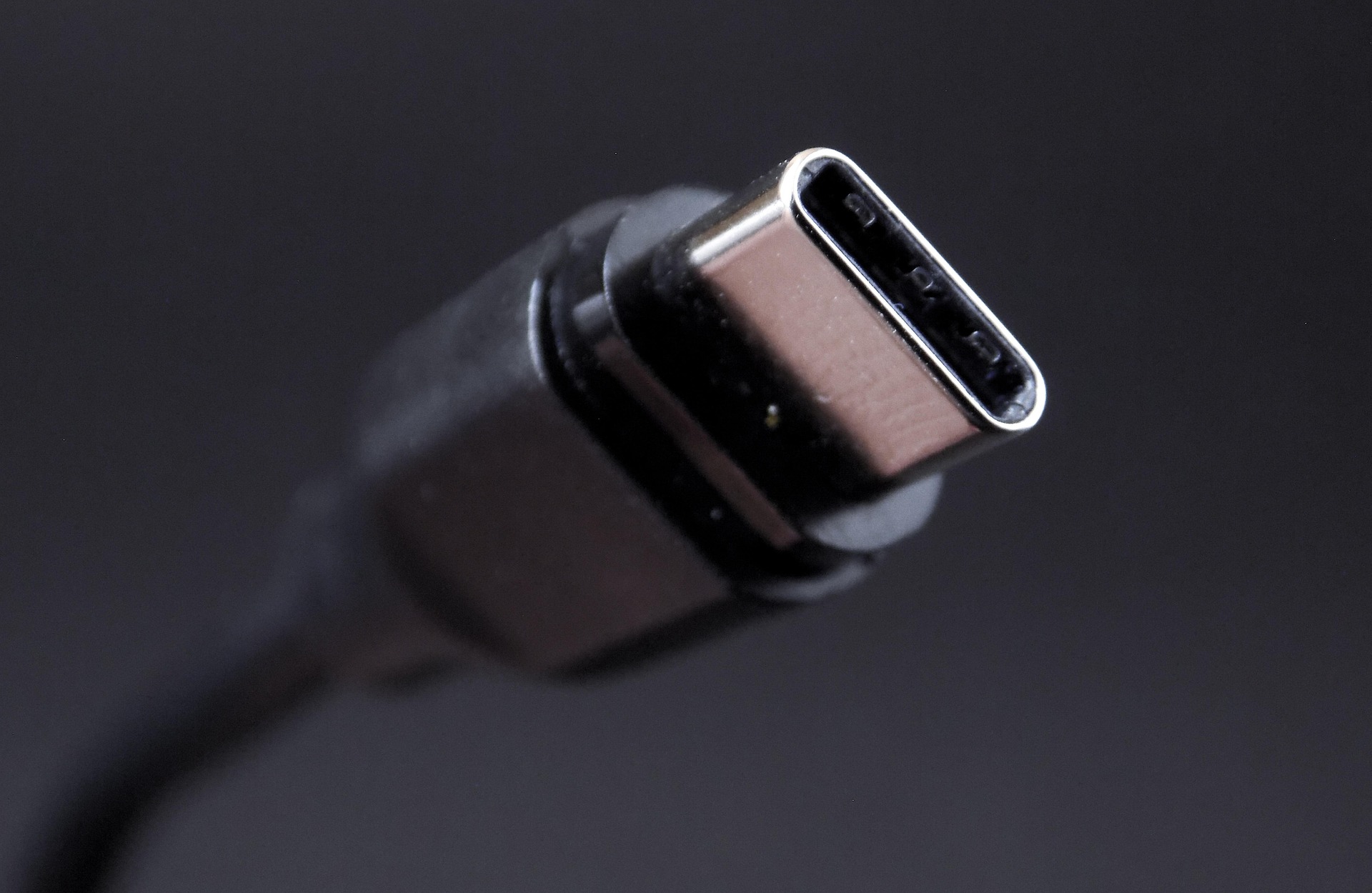 One end of a black USB-C cable