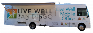 A photo of a bus. The words on the bus read, "Live well, San Diego. Live Well Mobile Office."