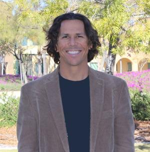 Professor Pablo Martin in the quad in front of the H-Building.